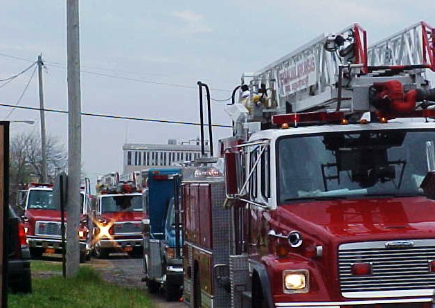 A long line up of fire trucks at the training day.